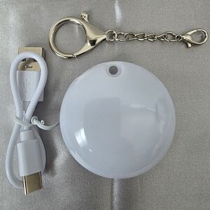 Elegant White Keychain Holder with USB Cable
